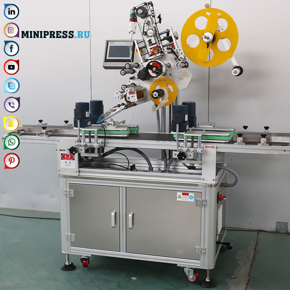 Label labeling machine on top of lids or boxes