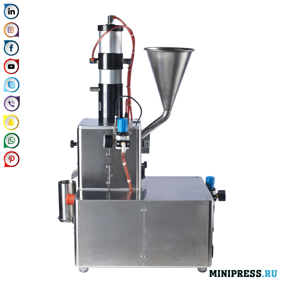 Pneumatic tablet press for tabletting powders