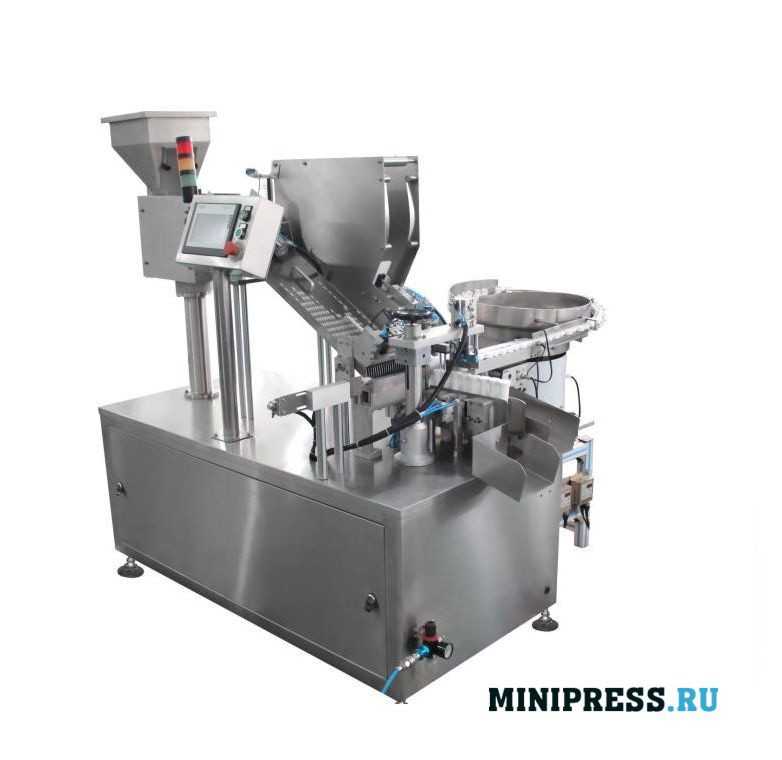 Automatic machine for group packaging of tablets into tubes GR-40